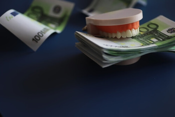 pros and cons of dental implants cost